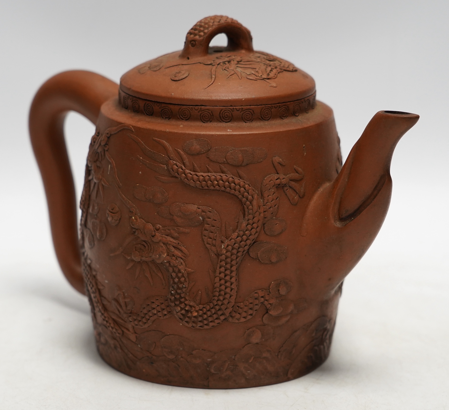 A Chinese Yixing ‘dragon’ teapot, 18cm high